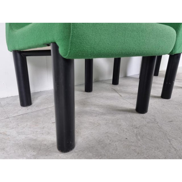 Design lounge chairs from the 1980s. Attractive and playful design. Designer unknown. Green fabric and black metal...
