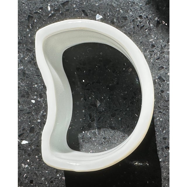 Beautiful porcelain hand painted Napkin rings. Curved back. New listing