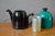 Tea time takes colors with this beautiful teapot 80s in shiny black porcelain, it is topped with a bell cover bright green...