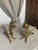 Pair of gilt bronze candlesticks depicting fantastic mythological creatures (such as a dragon, a griffin, a phoenix, or a...