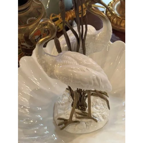 Danny's Fine Porcelain Pair of Standing Pelicans in Porcelain Bowl. Very fine condition as shown. Marked on bottom of...