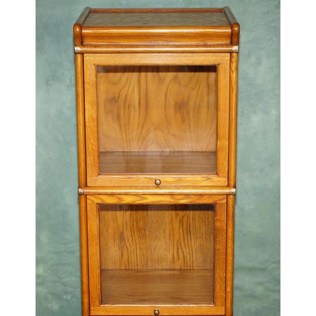 Antique Modular Honey Oak and Gilt Brass Stacking Bookcase with Glazed Retracting Doors For Sale - Image 3 of 18