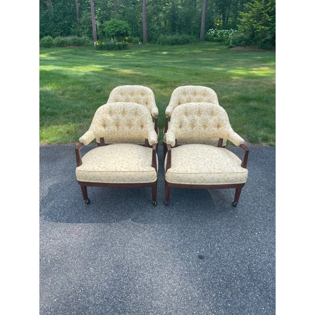 Set of four fabulous vintage Schoonbeck Henredon game or lounge chairs in original ivory upholstery. Chairs feature a...