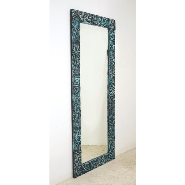 This one of kind wall mirror was made using antique 100 year old tin ceiling tiles in patch work design and a beveled...