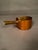 Charming French copper saucepan, handmade circa 1890, featuring a distinctive hollow handle designed to accommodate a...