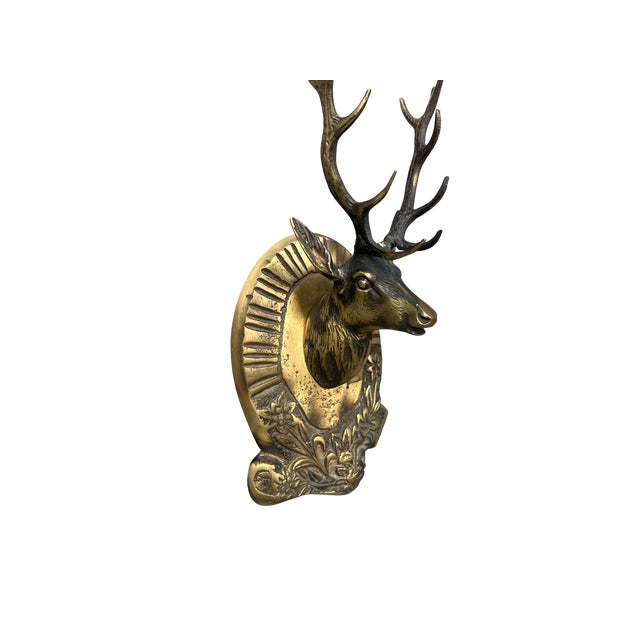 This handcrafted brass deer wall hook blends art and function beautifully. Its detailed antlers and floral base make it...
