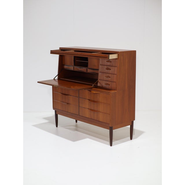 Beautiful secretary desk designed by erling torvits in denmark during the 1960s. This piece, featuring a drop-leaf desk,...