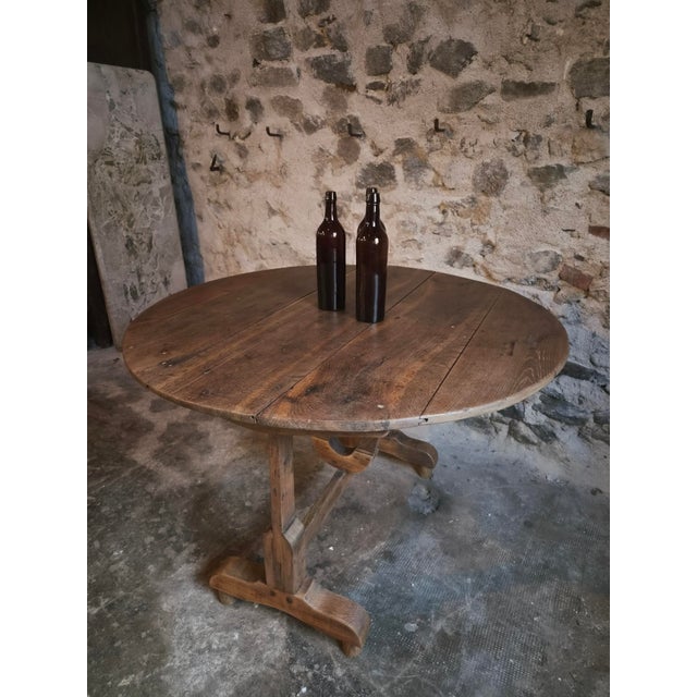 Antique oak wine table from the Burgundy region of France, dating from around 1830–1880. Made entirely from oak, it has a...