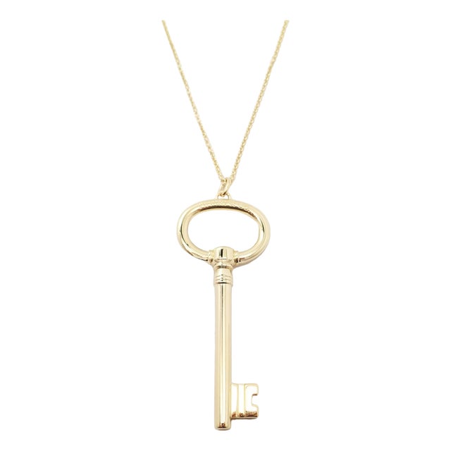 Tiffany & Co. Yellow Gold Oval Key Pendant Necklace For Sale