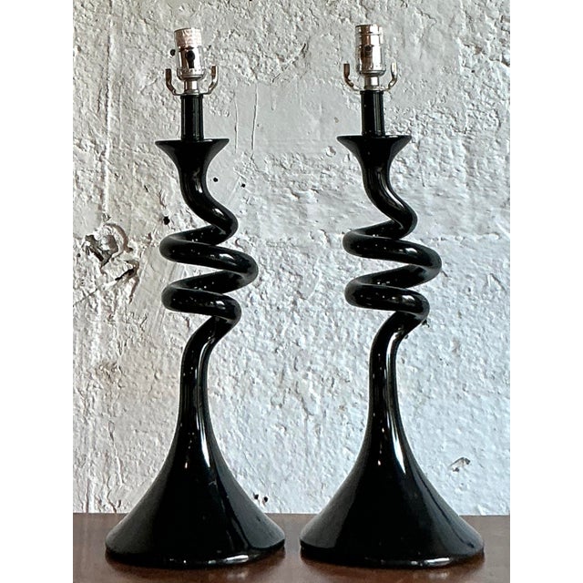Illuminate your interior with the dramatic flair of this stunning pair of vintage black glass lamps. Each lamp features a...