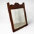 A charming French farmhouse style wall mirror crafted in richly toned mahogany and adorned with decorative carved...