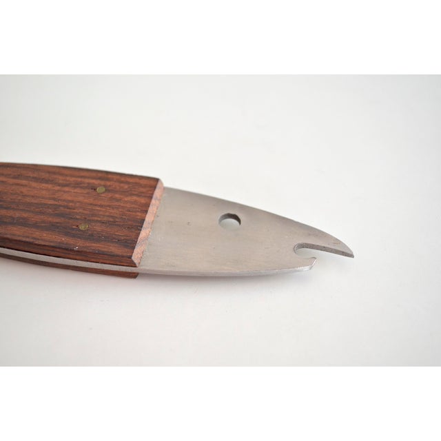 Scandinavian / Danish bottle opener - cap opener from the 1960s - the handles are made of teak - the opener itself made of...