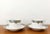 Limoges coffee service, Art Deco, 1925 Set comprising 7 cups and saucers. White porcelain cups with a blue floral frieze...