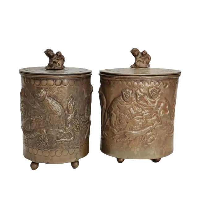 1990s Castilian Imports Brass Embossed Monkey Canisters- Set of 2 For Sale