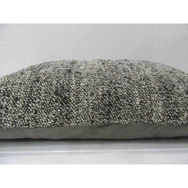 This is a pillow cover made from a vintage kilim rug. The piece was properly washed and ready to use. Pillow inserts not...