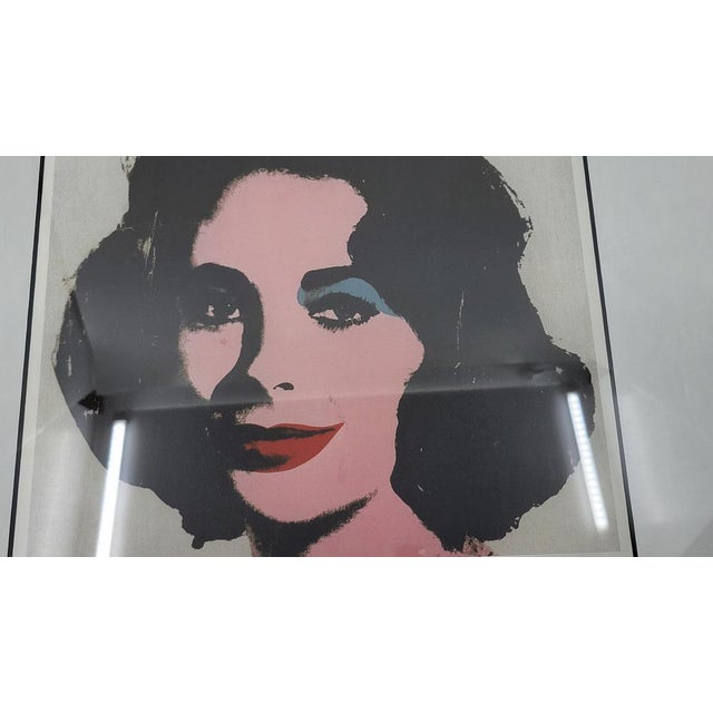 This work by Andy Warhol, entitled "Liz Taylor", is a very rare and limited edition offset, numbered 133/300. Signed in...
