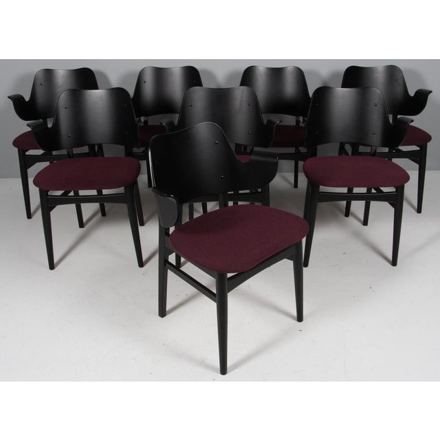 Hans Olsen armchair with frame of black lacquered wood. Seat original upholstered with Coda2 from Kvadrat. Model 107, made...