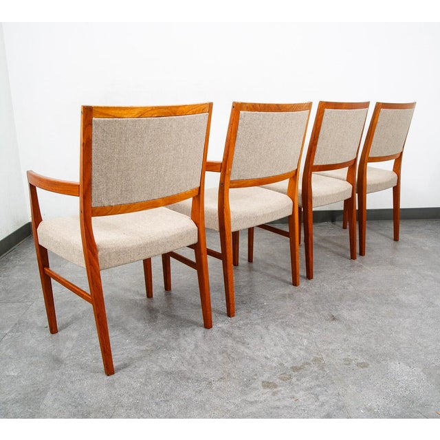 Set of 4 solid teak dining chairs by Svegards, Sweden in off white tan wool tweed fabric. Classic look and design....