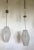 This set of two vintage adjustable light pendants were designed by Paolo Venini in the 1950s and are made of polished and...