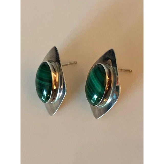 These stunning Navajo Selina Jake Malachite Sterling Modernist Earrings will garner lots of oohs and aahs when worn, day...
