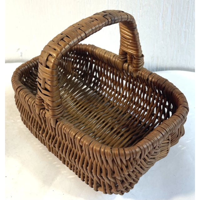 Vintage rounded bottom handled basket