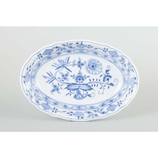 Meissen Oval bowl, “Blue Onion” pattern, mid-20th century. Elegant hand-painted porcelain bowl with underglaze blue “Blue...