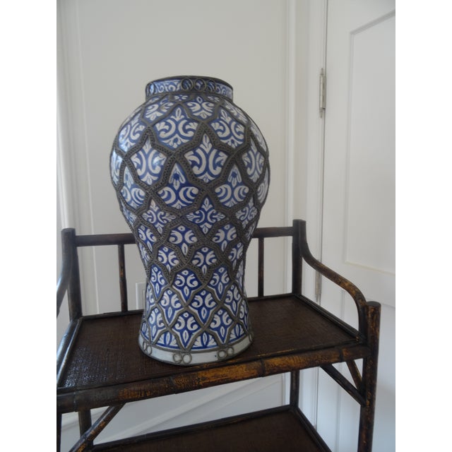A Fabulous vintage hand crafted painted jar with nickel silver filigree.