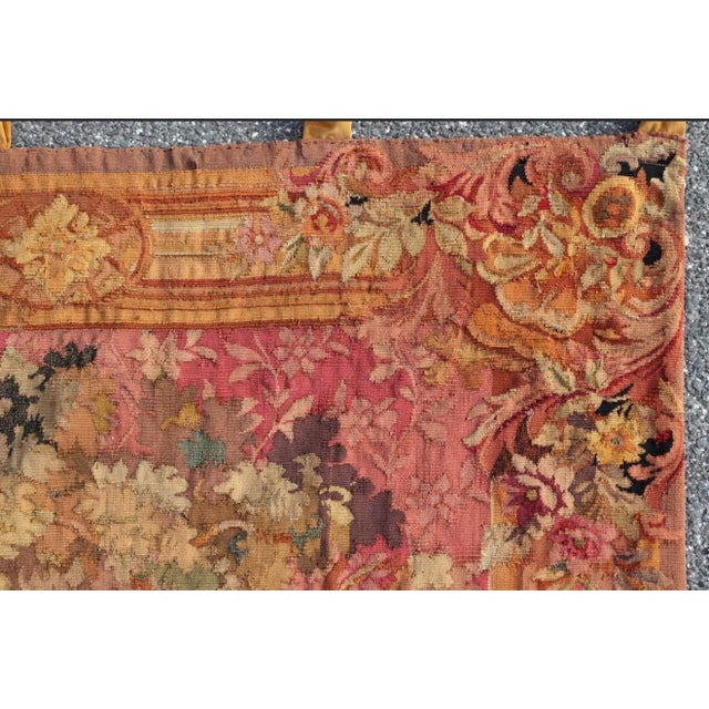 An elegant and richly detailed late 19th-century French Aubusson-style tapestry depicting a romantic pastoral landscape...