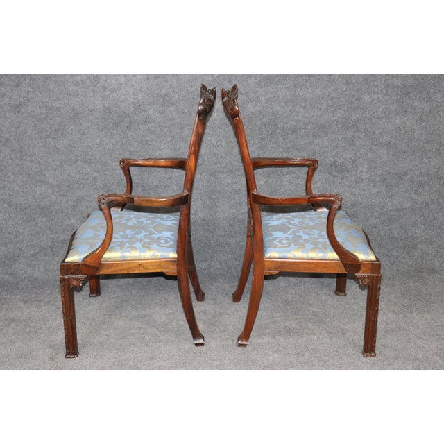 Refine your dining room with this extraordinary set of six Chinese Chippendale dining chairs, masterfully crafted in the...