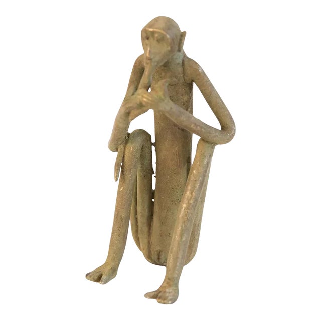 Vintage African Sitting Monkey Eating Banana Sculpture For Sale