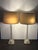 Offered for your consideration, A pair of mid-century glass column lamps with brass mounts. Quality craftsmanship with a...