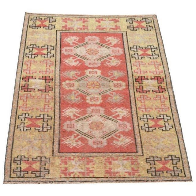 Hand-knotted with care using traditional rug-making techniques, this wool rug blends timeless craftsmanship with a modern...