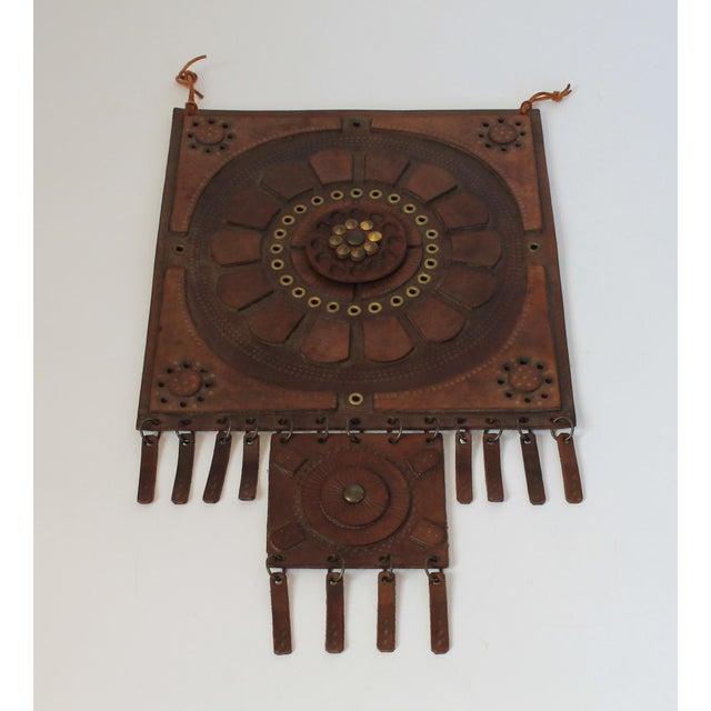 Vintage hand tooled leather wall art hanging. No makers makers mark. Minor age wear.
