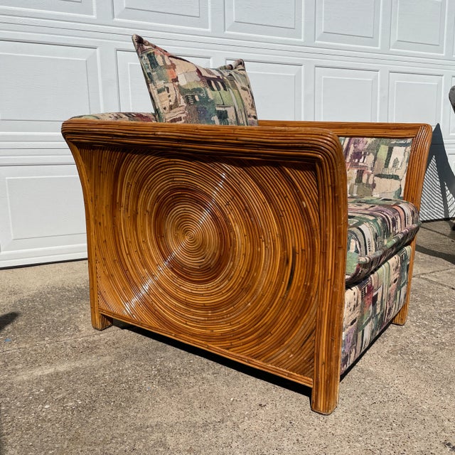 Gabriella Crespi style circular pencil reed rattan club chair. Stunning figural bamboo work moving across this shaped...