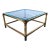 Vintage solid brass tubular rounded corner base coffee table, with signature beveled glass inset top, manufactured in...