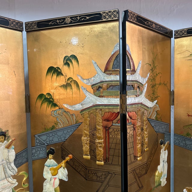 Vintage gold gilded Asian screen/ room divider. Three dimensional Asian woman sculptures. Back of screen is a beautiful...