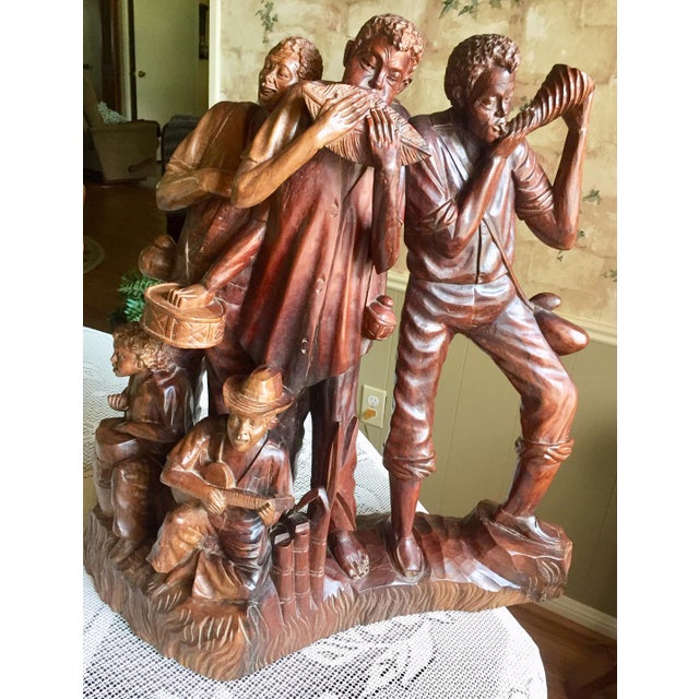 This is a very impressive and exquisite handmade and intricate wooden carving that my Dad bought while living in...