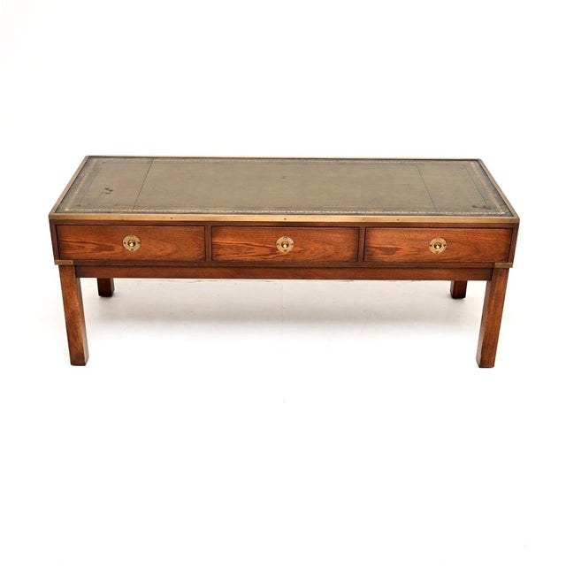 A fantastic antique military campaign style coffee table. This was made in England, we would date it from around the...