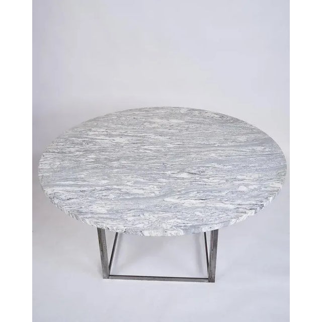 Rare dining table, model pk54, designed by poul kjærholm and produced by e. Kold christensen in the 1960s. The table is...