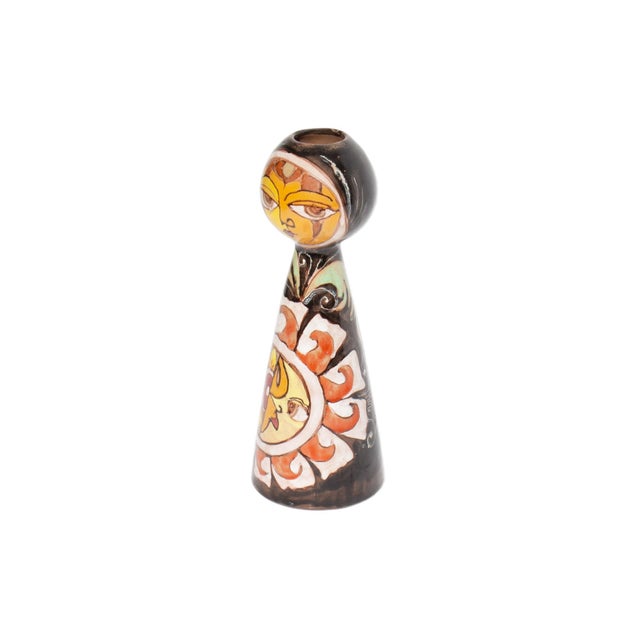 A figural ceramic vase designed by Elio Schiavon in collaboration with Gunter Erhart for Erhart S.K.K. This vase features...