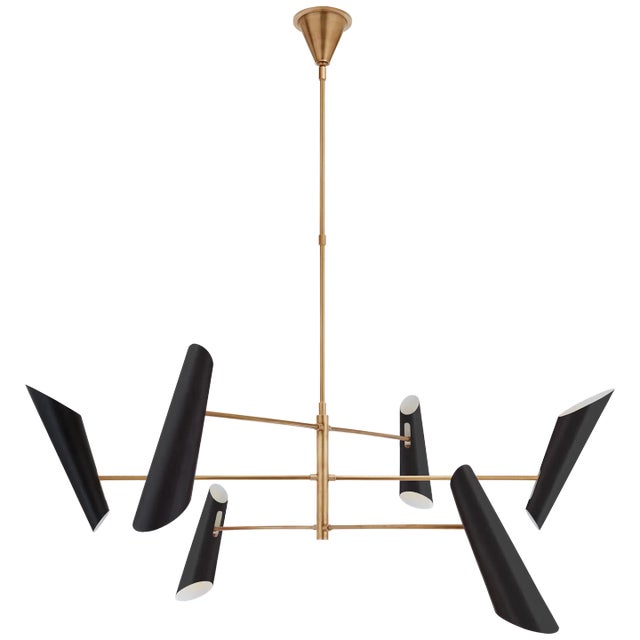 Franca Large Pivoting Chandelier in Hand-Rubbed Antique Brass with Black Shades Designer: AERIN Fixture Height: 18.25"...