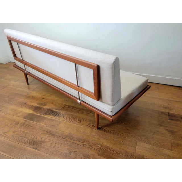 A beautiful Danish vintage teak sofa/daybed from the Minerva series. Designed by Peter Hvidt and Orla Mølgaard-Nielsen and...