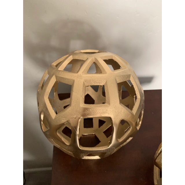 Early 21st Century Modern Contemporary Gilt Metal Large Cutout Orbs / Globes - a Pair For Sale - Image 5 of 6