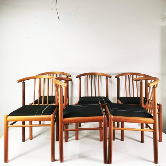 A set of 6 chairs manufactured in Denmark in the 1970s (each chair bears a maker's mark). The chair frames are constructed...