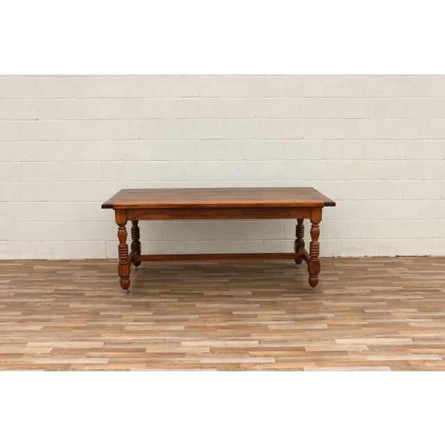 Bring timeless French country charm into your home with this beautiful antique French Provincial refectory dining table by...