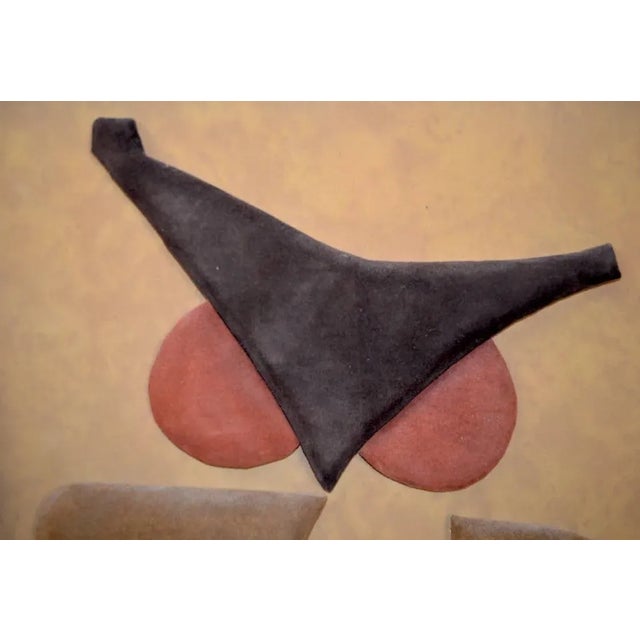 Stylized owl, done in suede trapunto, mounted and framed, ready to hang, circa 1970s. Marked SeVer 46/750. (Possibly Klara...