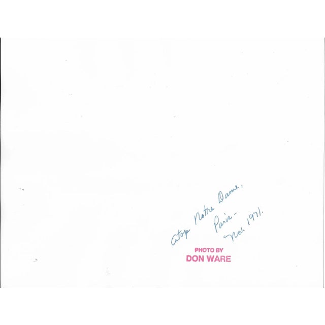 1971 black and white photo by Don Ware (1921-2006) of the Parisian rooftops from the top of Notre Dame. Titled, signed and...