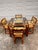 Vintage dining set in great vintage condition. The armchairs have brass tips. Each chair is accented by vibrant yellow...
