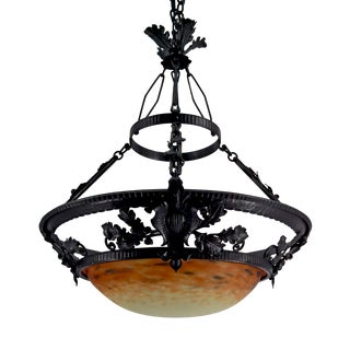 Pendant Light in Wrought Iron and Blown Glass Paste attributed to Muller Frères Lunéville, France, 1900s For Sale