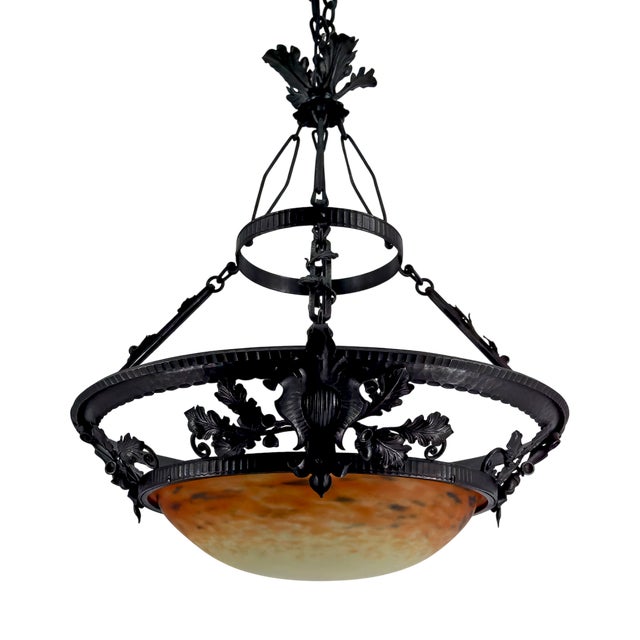 Pendant Light in Wrought Iron and Blown Glass Paste attributed to Muller Frères Lunéville, France, 1900s For Sale